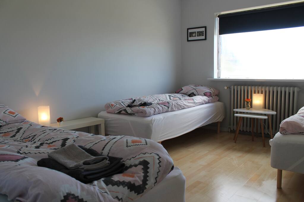 The room has three beds