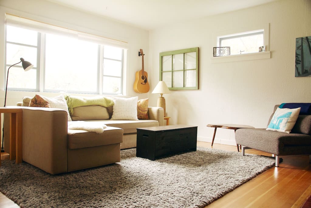 For maximum capacity, the couch pulls out to sleep two people and the chair folds out into a single bed!