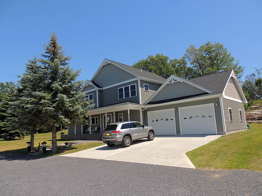 Front of the house with a 2 stall garage.
