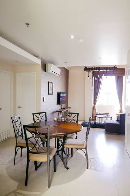Once you enter the front door, you are greeted with spacious, naturally lit Dining and Living Rooms.