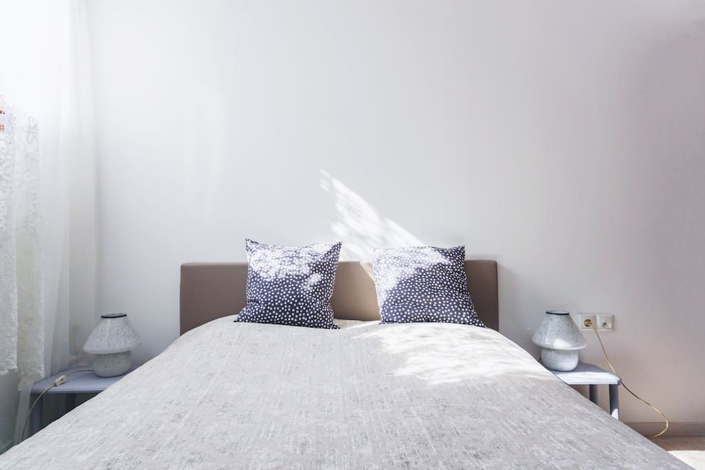 The double bed with a comfortable mattress.
