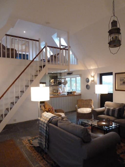 Main living space with loft above