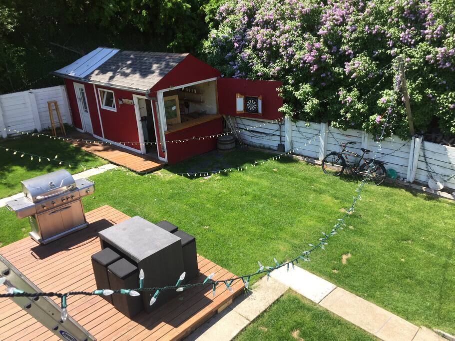 The back yard. A great place to BBQ and relax, with or without the friendly host.
