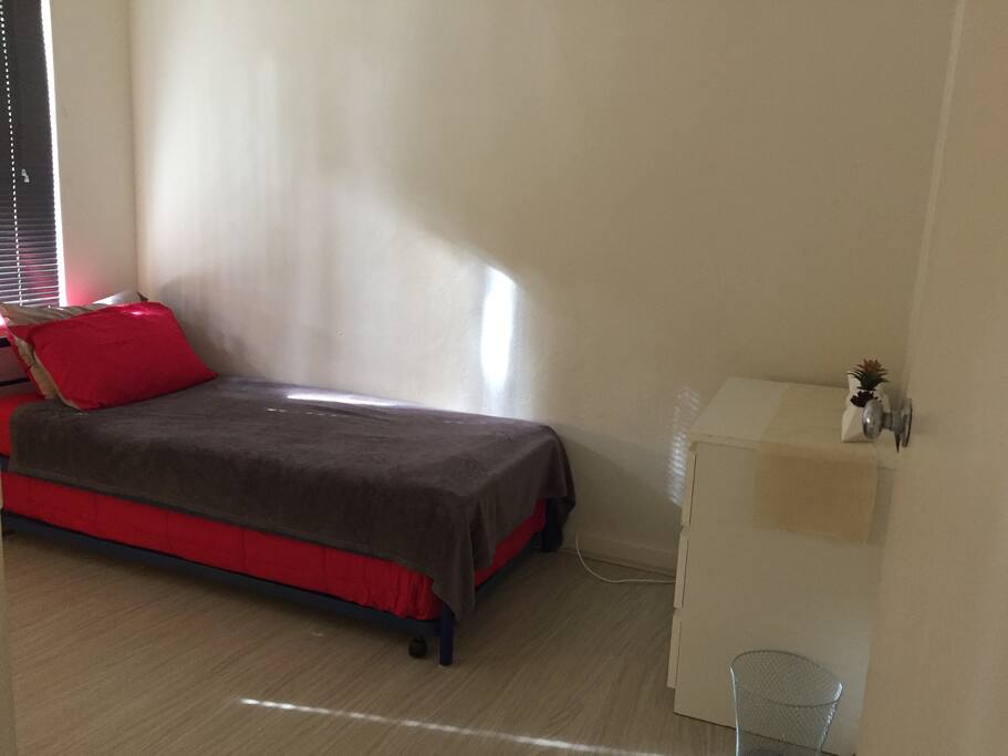 Trundle beds in the small room. Great for kids!