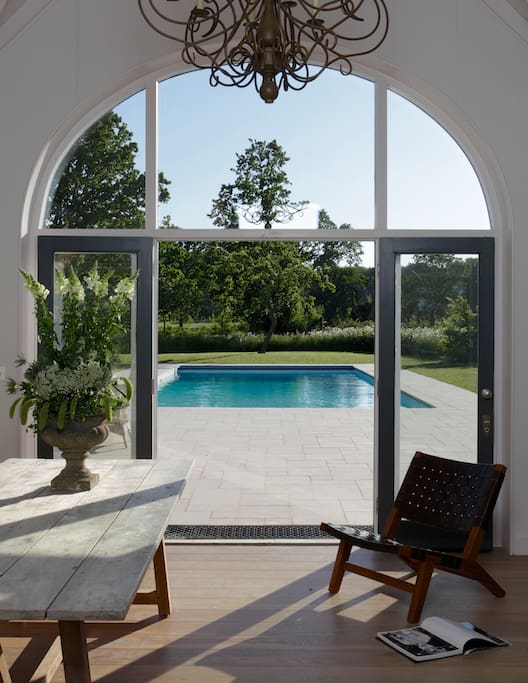 The newly built pool house is the perfect place to unwind on a summer evening