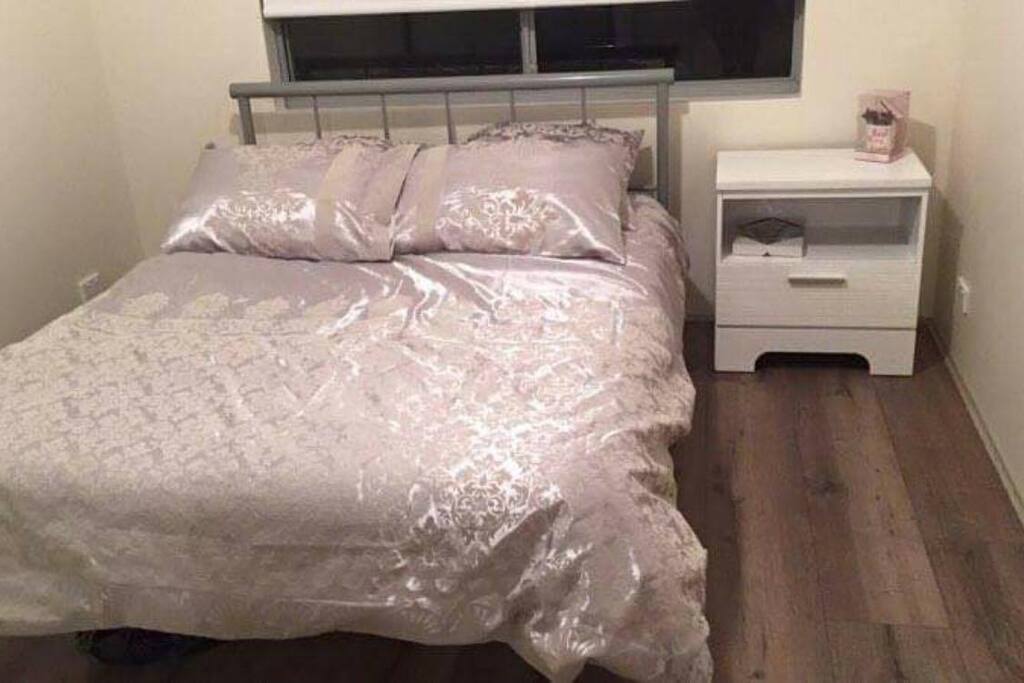 Bedroom 1 with double bed and side table. There is also a double mirrored wardrobe with hangers for your convenience.