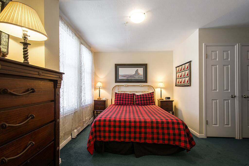 Queen size bed in first room