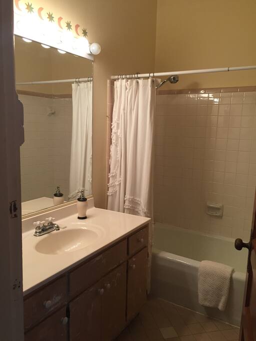 Shower and tub split bath