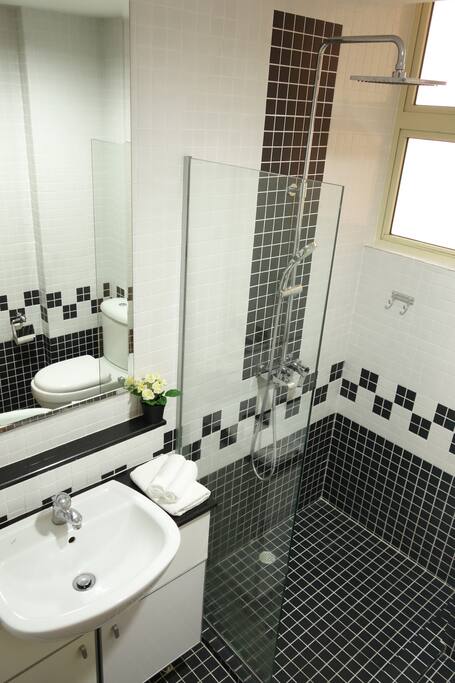 Private bathroom with rainfall shower-head