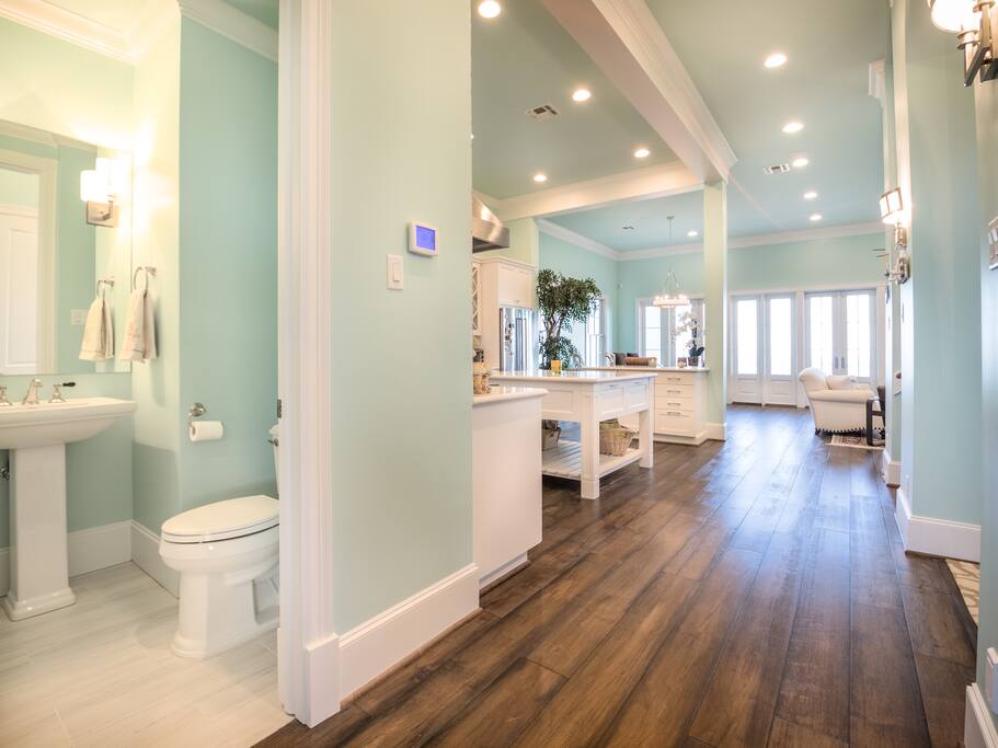 View of the second floor of the kitchen, hall way to the ocean front, balcony.