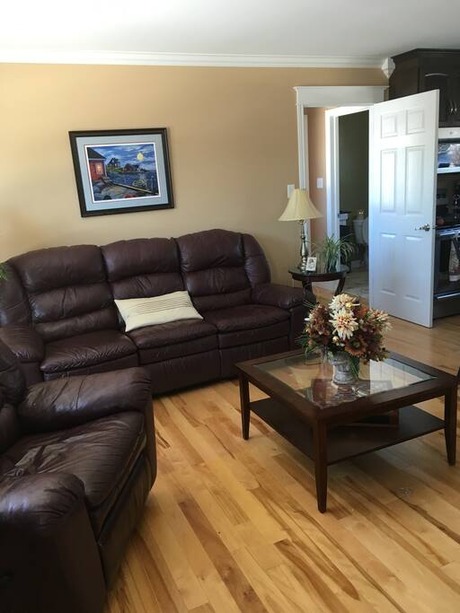 Relax in reclining sofa and chair in the Sitting room