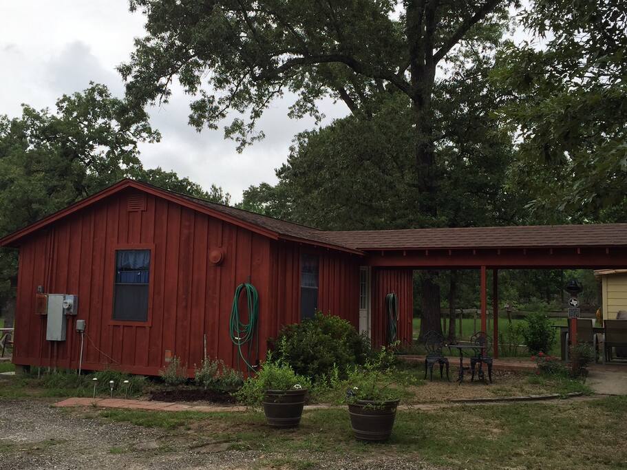 Private Guest Cabin with 1 bedroom, living area, kitchenette, and full bathroom