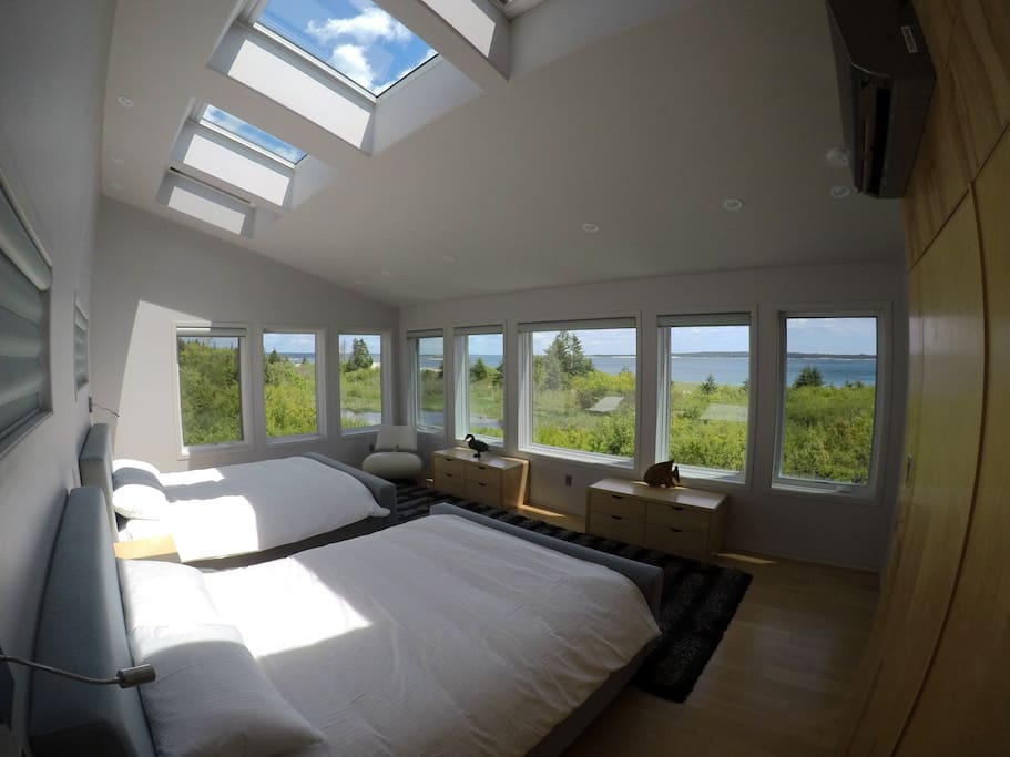 First bedroom with panoramic ocean view and big skylights.