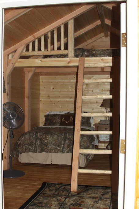 Cabin offers two double beds below and a Queen in the loft.