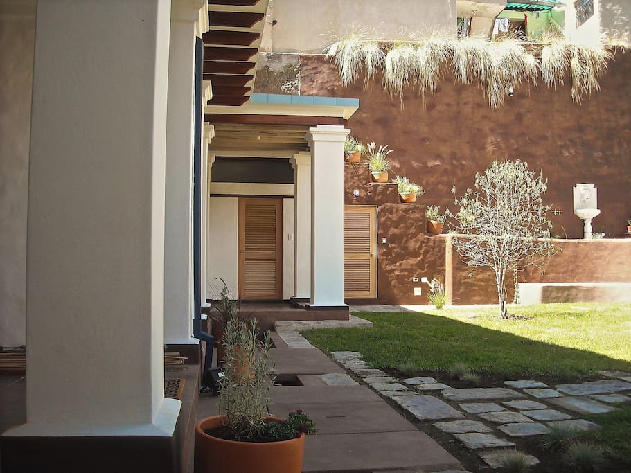 step out of your apartment into the garden