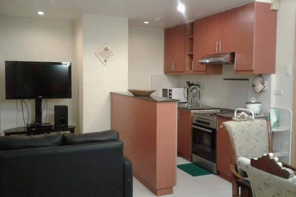 compact kitchen with exhaust hood