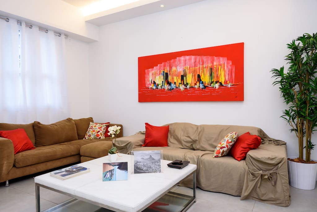 Living room,ceiling fan,flat located just one block from the beach Copacabana othon hotel area beach