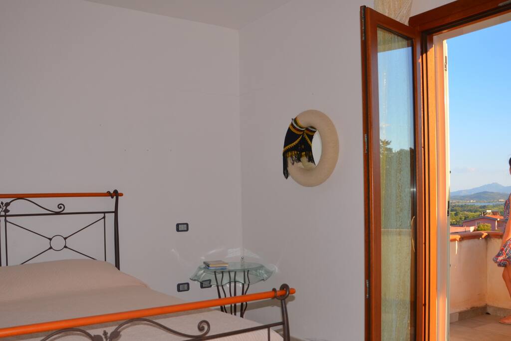 Camera tripla con veranda vista mare