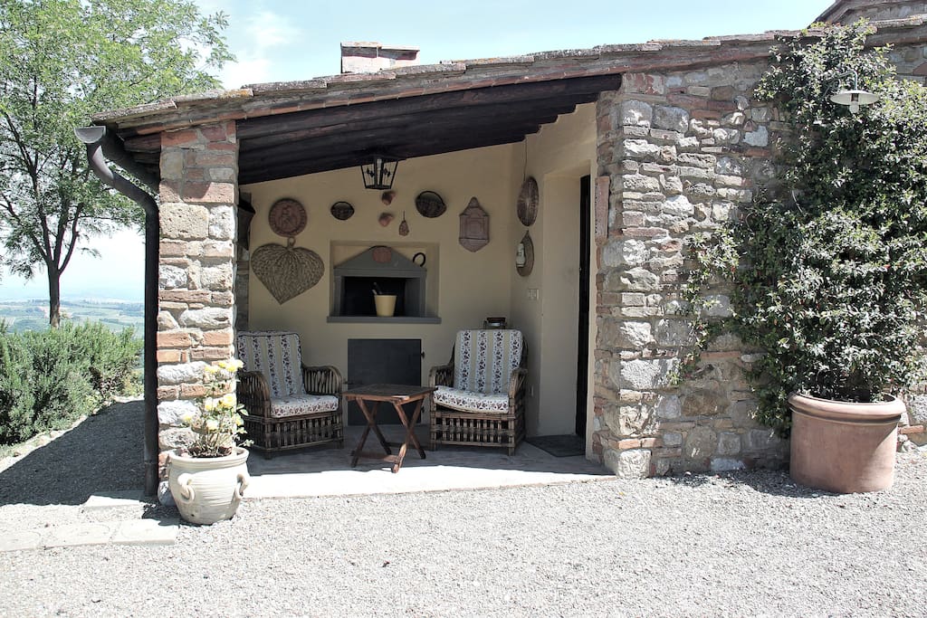 Your private small Veranda. Behind the house you have a private small panoramic area with Table and Sun Umbrella :)