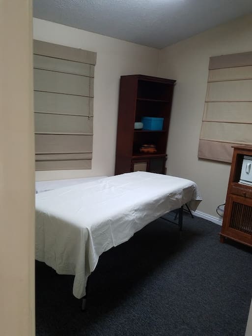 Fully stocked massage room, towel warmer, sheets, towels, oil, candles, music