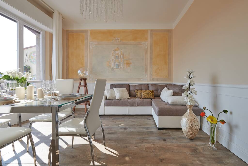 living room n.1 with a matrimonial sofa bed
and entrance to the main balcony (4th floor)