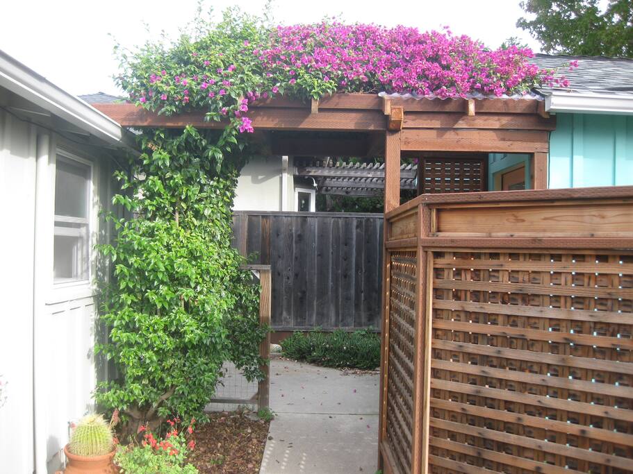 private entrance off driveway in rear of house
