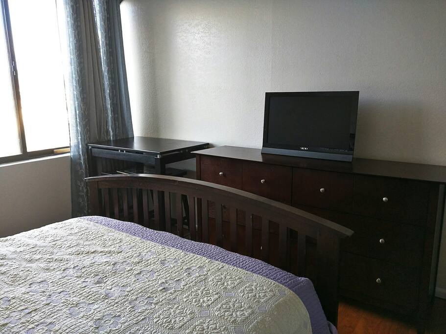 Well-appointed dark real-wood furniture set