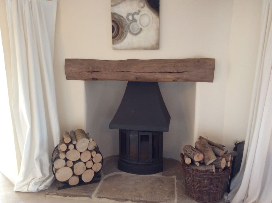 Cosy log fire in guests sitting room for those cosy nights in...