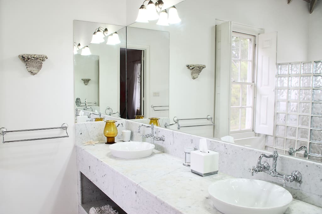 Marble detailed bathroom with double sinks