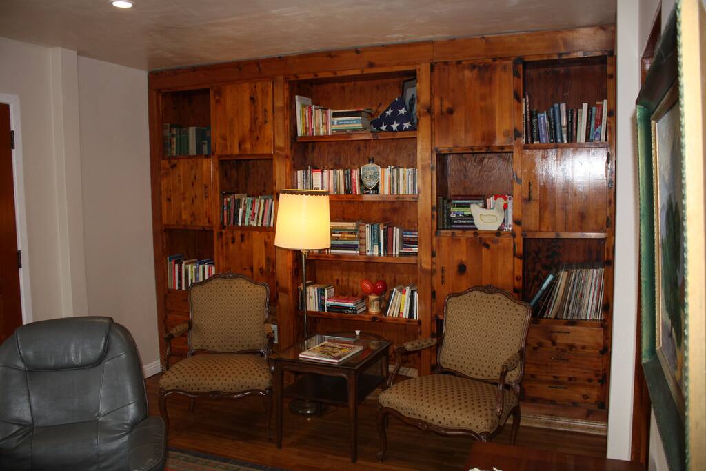 library with reading lamp and chairs.