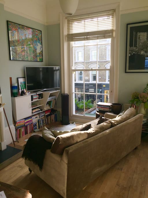 Living room, sunny, large windows on toWestbourne grove! Fab open plan and great couch!