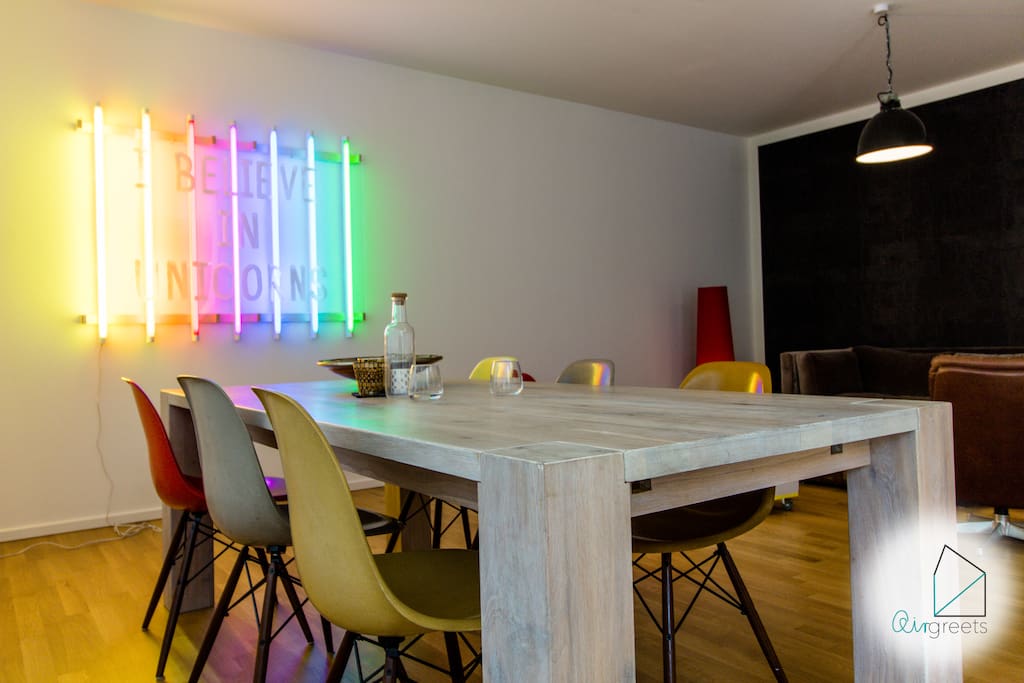 Spend some time together at the large table in the living room.