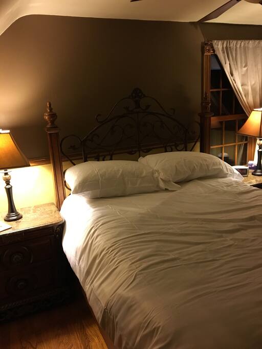 Large master bedroom with queen bed.