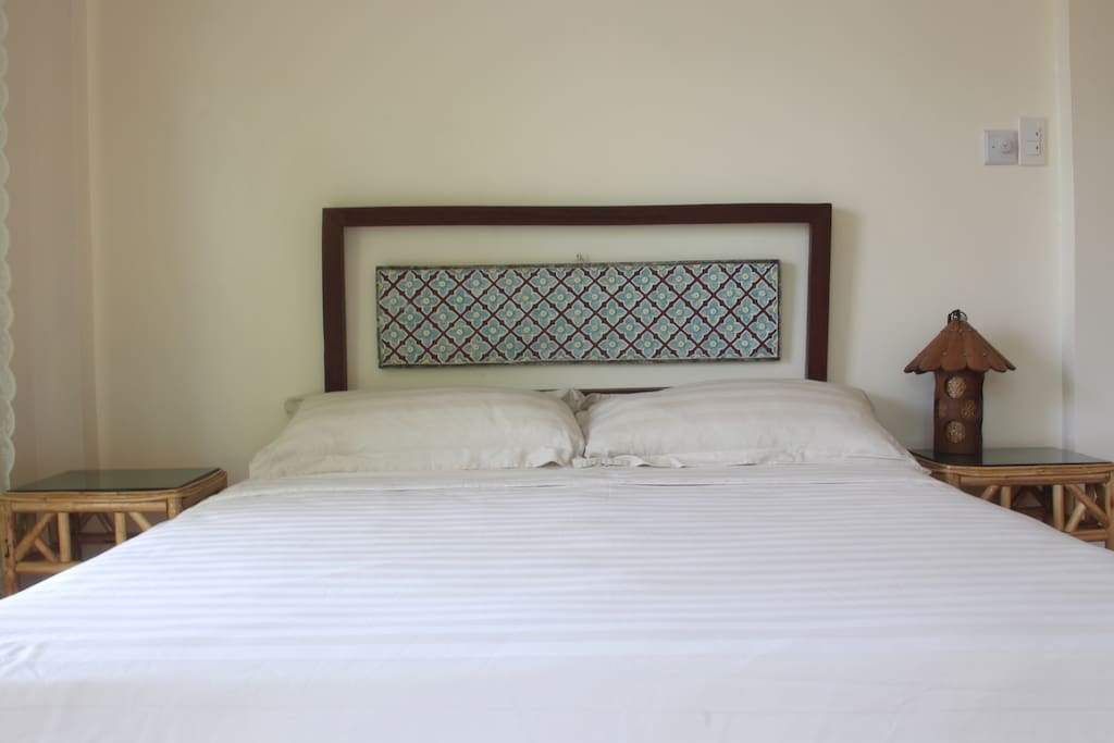 Interior decorated with native furniture & crafts, paintings and photos.