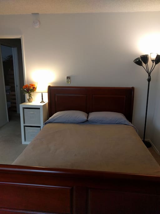 Cozy queen sized bed to catch some zzzz's