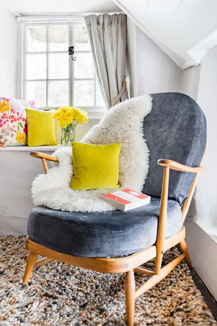 A beautiful restored vintage Ercol chair, is that perfect spot to read for a while..