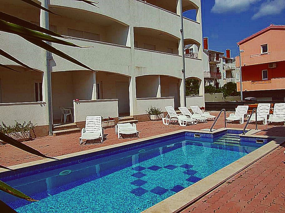 Small building with only 15 luxury apartments with free access to swimming pool and BBQ area
