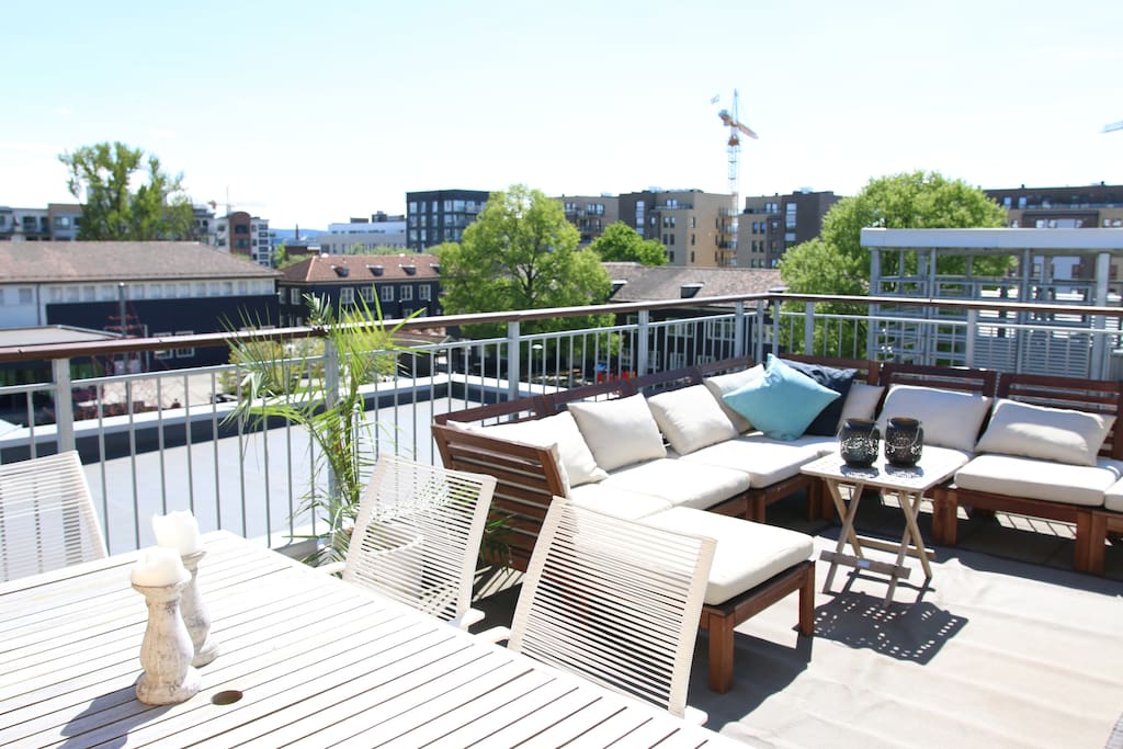 Private roof top terrace with lounge and dining area