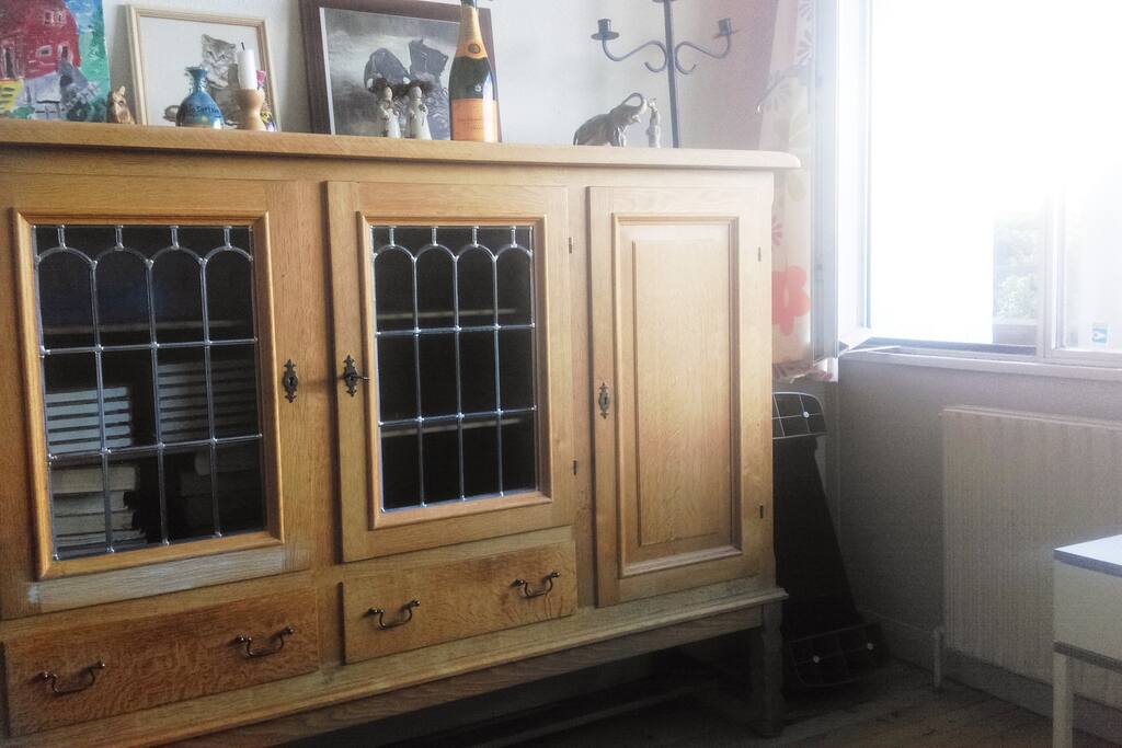 The buffet across from the bed is not empty but will have some space for your stuff.