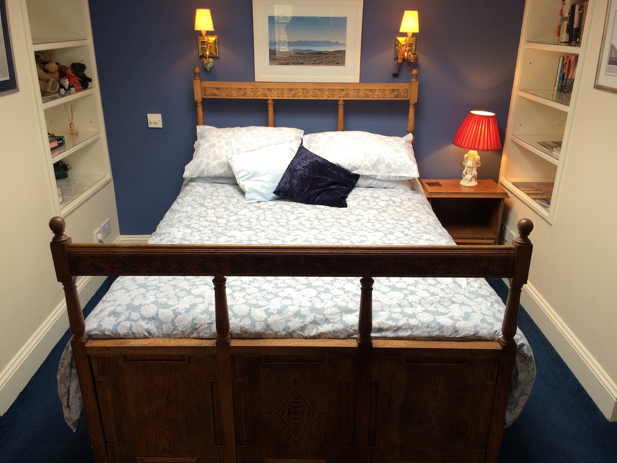 Your bed with skylight above to watch the stars - there is a blind!