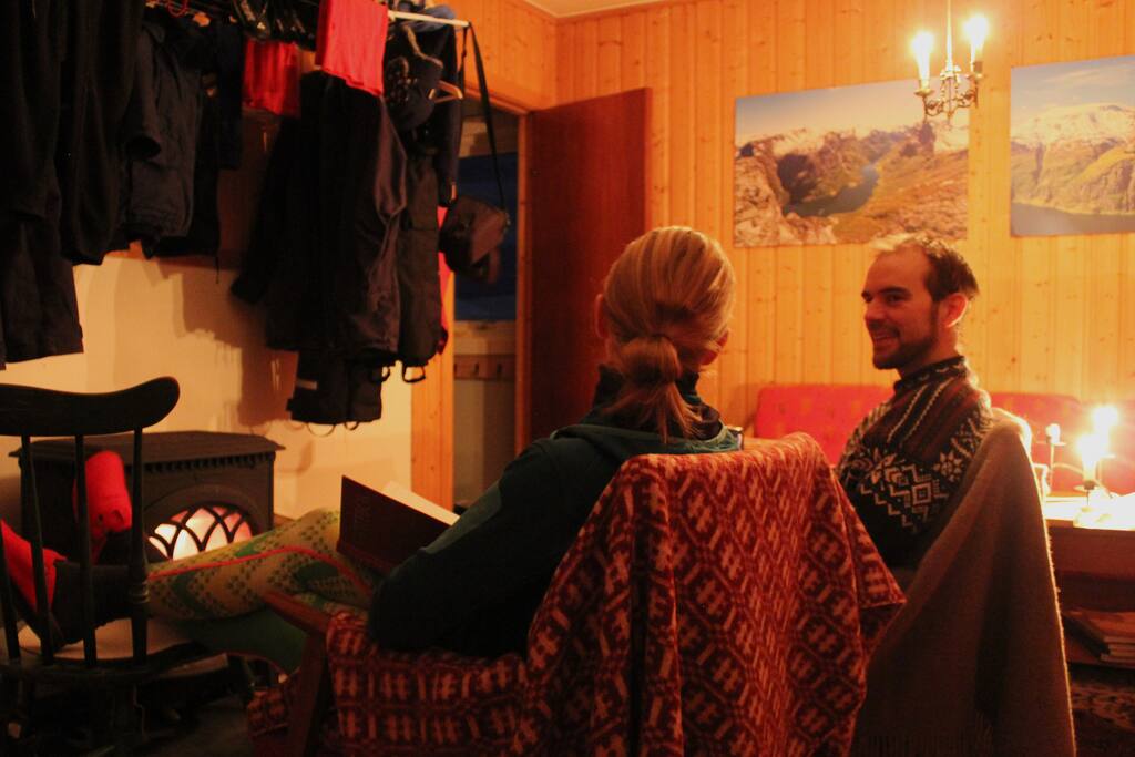 Enjoying the heat in the cabin living room while the clothes are drying.