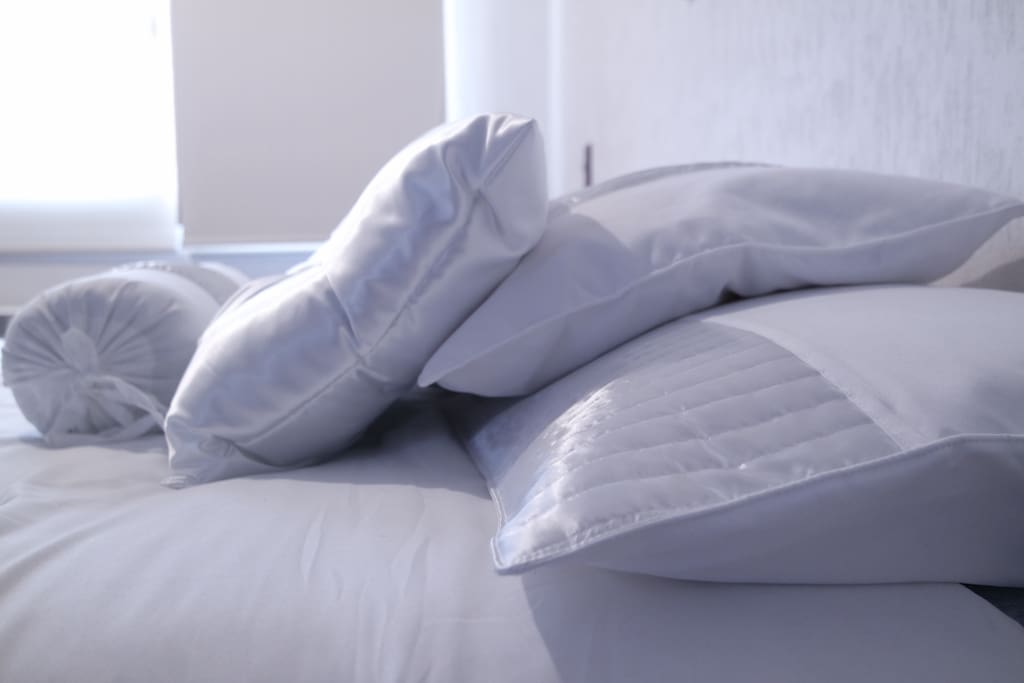 Comfy bed waiting for you to plunge into comfyness!