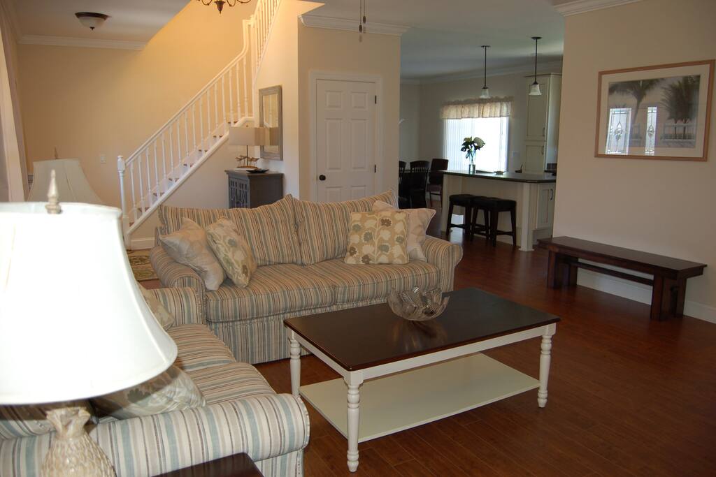 The spacious living leads into the kitchen and dining areas.room