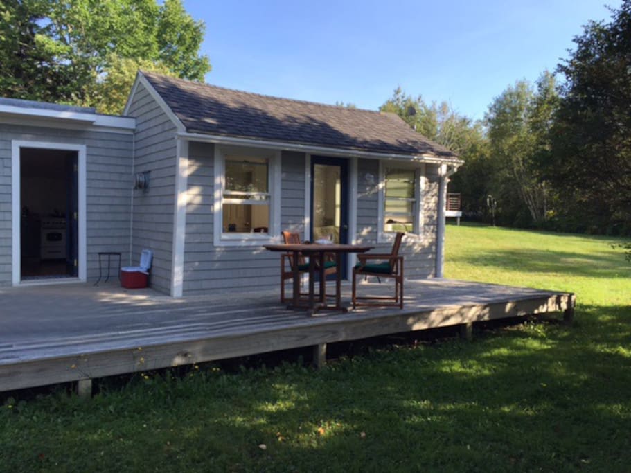Cottage: Includes a deck for relaxing, outdoor furniture, and grill.