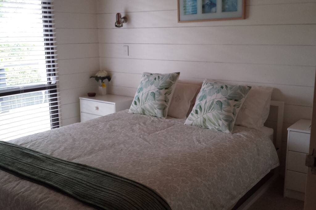 2nd bedroom opening out to deck area.