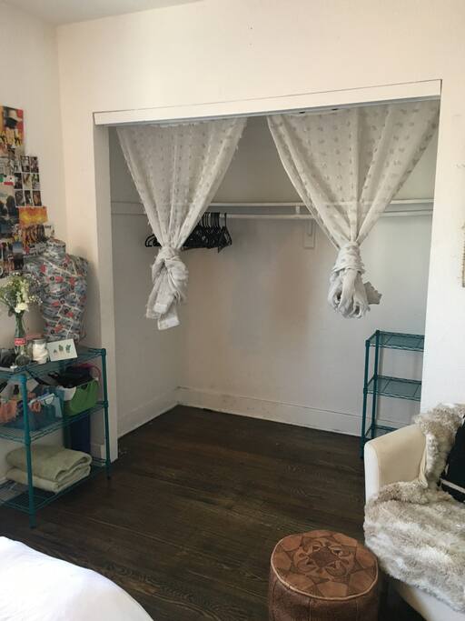 CLOSET WITH HANGERS AND STORAGE