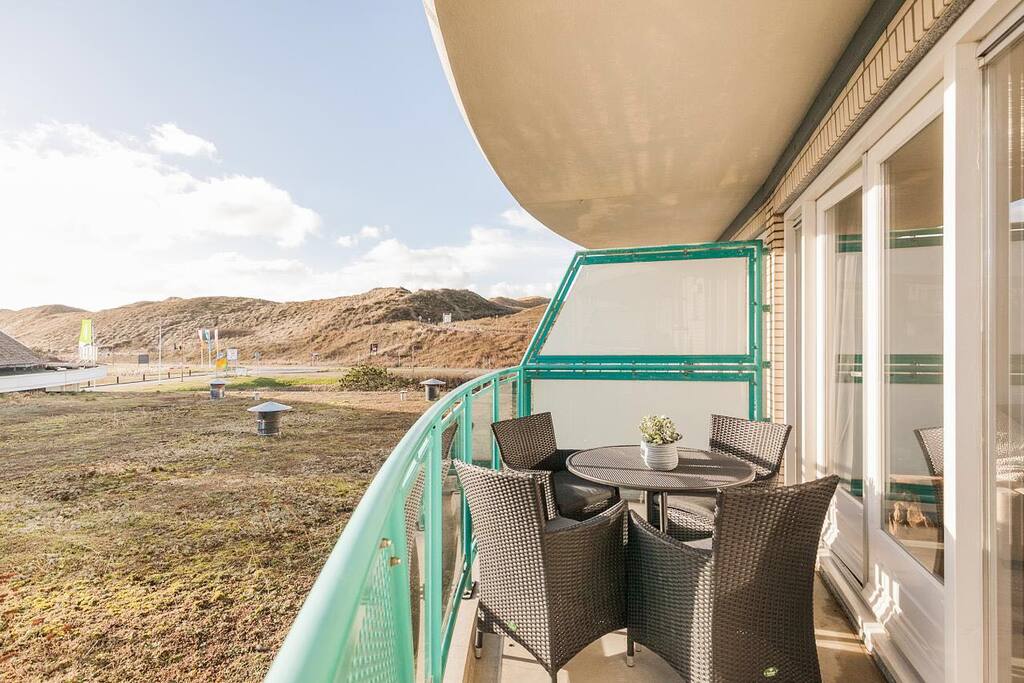 Balkon met zicht op de duinen