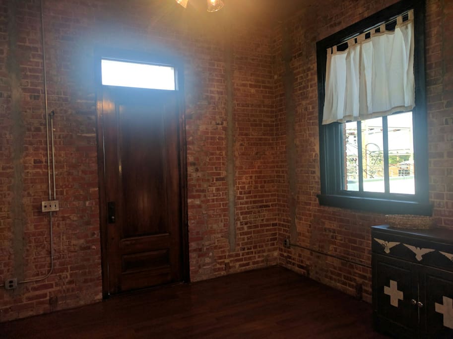 High ceilings, exposed brick and original historic windows.