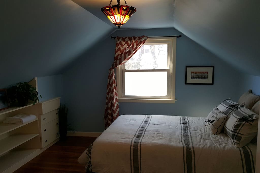 Bedroom shown without the AC in, but it's there all Summer long.