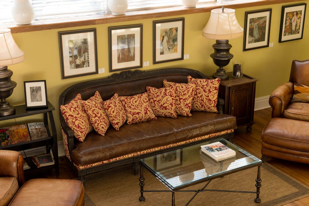 Sitting area with leather sofa & chairs